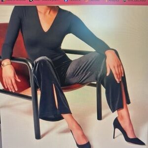 Spanx black velvet pants with front slits at the bottom of the legs ￼
